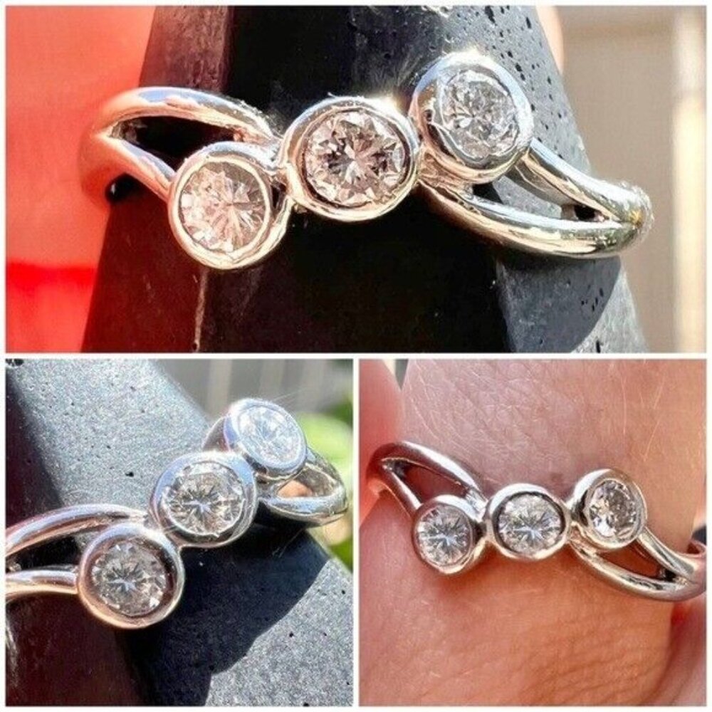 PLATINUM PT 900 .25 ctw 3 DIAMOND BEZEL SET RING